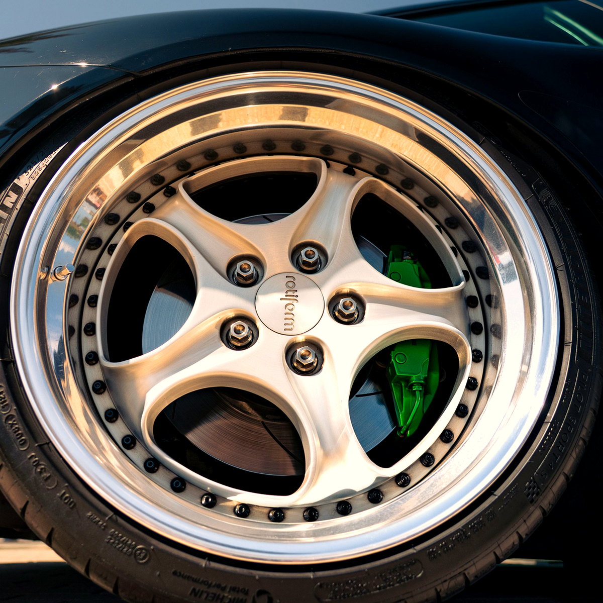 Polished five-spoke alloy with a chrome lip